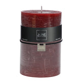 Bougie cylindrique J-Line bordeaux XL avec lumière douce, style classique.