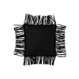 Coussin J-Line en cuir noir avec franges sur canapé moderne