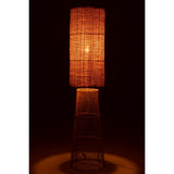 Lampe J-Line sur une table de nuit en bois