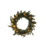 Couronne J-Line LED verte sur un mur décoratif