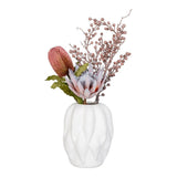 Vase en céramique beige, vue latérale montrant la forme élégante