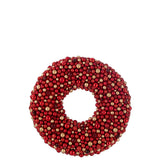 Couronne J-Line ronde en plastique rouge et or, élégante et festive.