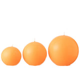 Bougie J-Line en cire fluo orange, ambiance chaleureuse