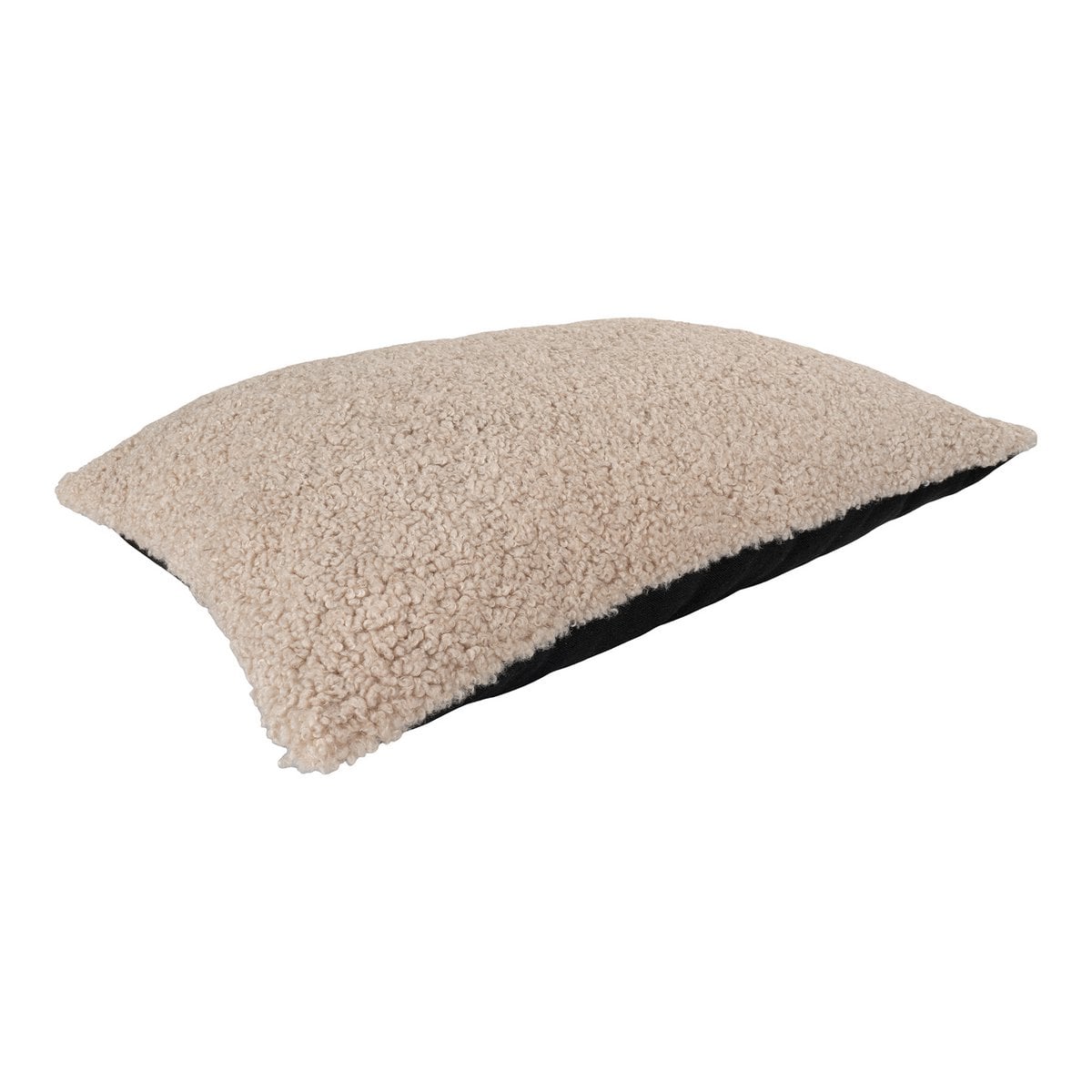 Gros plan du coussin Tavira montrant sa texture bouclée et ses couleurs élégantes