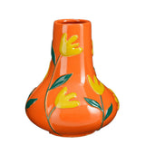 Vase Ava Orange avec motif floral en jaune et vert, en céramique.