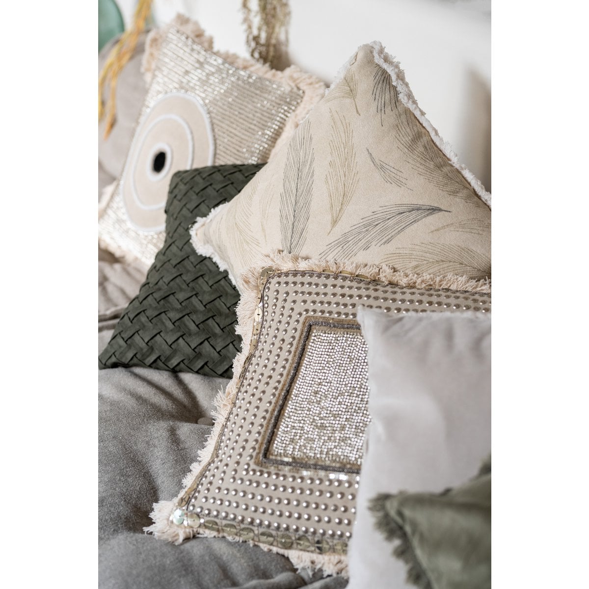 Coussin J-Line vert, détail du coin et couture