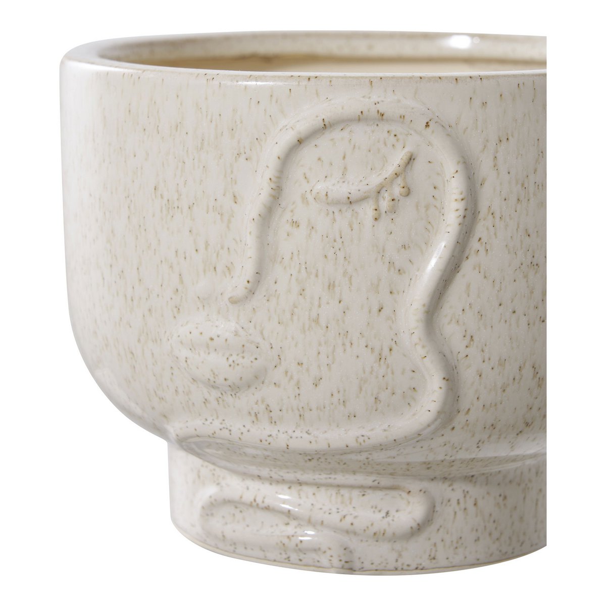 Pot de fleur beige en céramique sur une table moderne