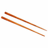 Les baguettes en racine de teck