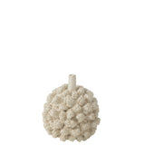 Vase Saki avec des fleurs, ajoutant une touche de nature à votre décoration.