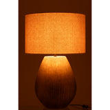 Détail de la céramique dorée de la Lampe Nebu