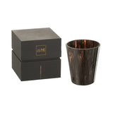 Bougie J-Line Noa - Woody Aurora posée sur une table en bois