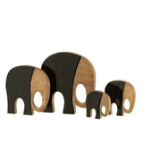 Éléphants en bois sur une table - ambiance vintage