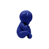 Statue Amigo Assis Grand en bleu, vue latérale montrant sa finition élégante.