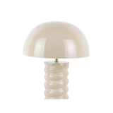 Détail de la lampe Gracio en fer, couleur gris, sur une table moderne