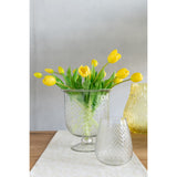 Détail du vase J-Line en verre, élégant et moderne.
