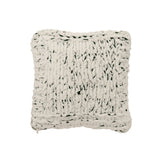 Coussin J-Line blanc/vert sur un canapé moderne