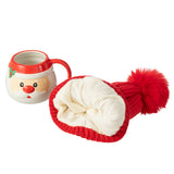 Chapeau de Père Noël en céramique J-Line sur fond décoratif