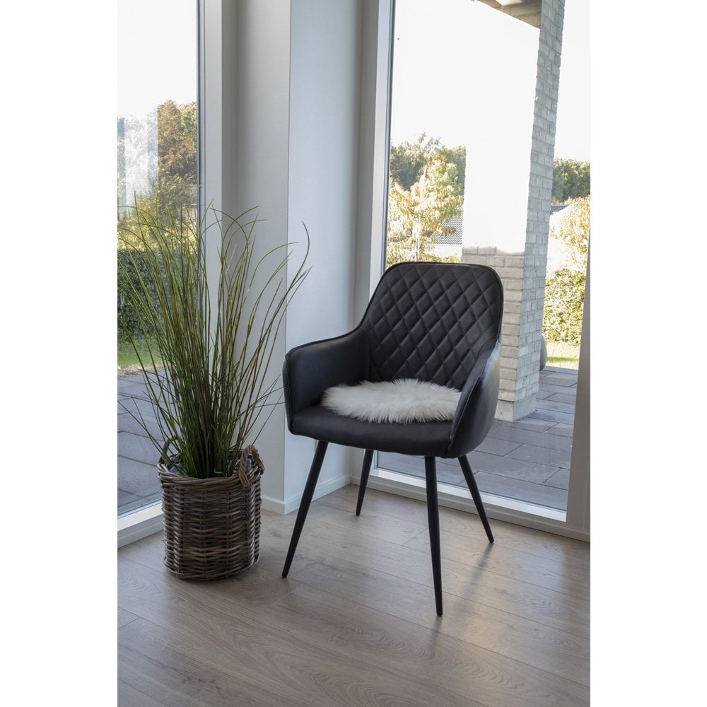 Détail texture douce coussin peau d'agneau artificielle