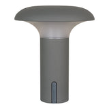 Lampe LED Ramsey illuminant un coin lecture, couleur gris argenté.