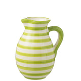 Karaf J-Line Grenada Stripes sur une table élégante, décorée avec style