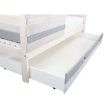 Tiroir de lit ouvert montrant espace de rangement pour jouets