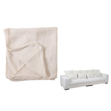 Housse Monaco Linen XL avec coussins blancs en situation dans un salon moderne.