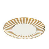 Assiette J-Line Stripe en porcelaine dorée sur fond neutre