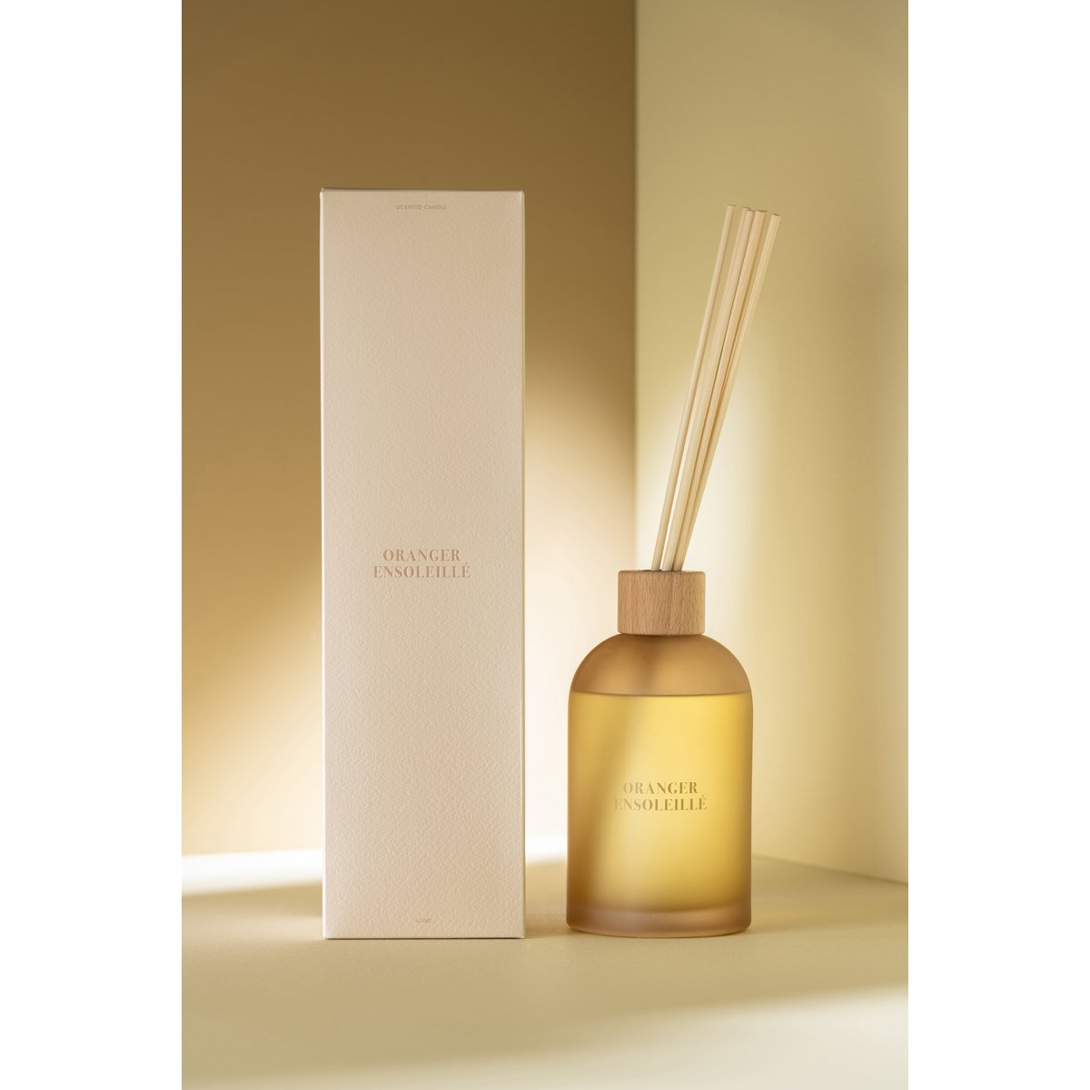 Bâtonnets parfumés J-Line Oranger Ensoleillé sur table