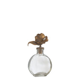 Détail de la bouteille J-Line Flower en métal et verre doré, design moderne