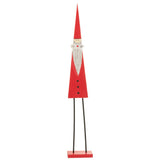 Détail du Père Noël en bois rouge, ambiance chaleureuse