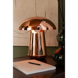 Ambiance chaleureuse avec la lampe champignon dans un salon
