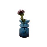 Vase Gusto en verre bleu, vue de côté montrant sa transparence