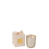 Ambiance chaleureuse avec la bougie parfumée J-Line Merci sur une table