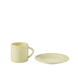 Tasse J-Line en céramique jaune avec soucoupe, vue de face