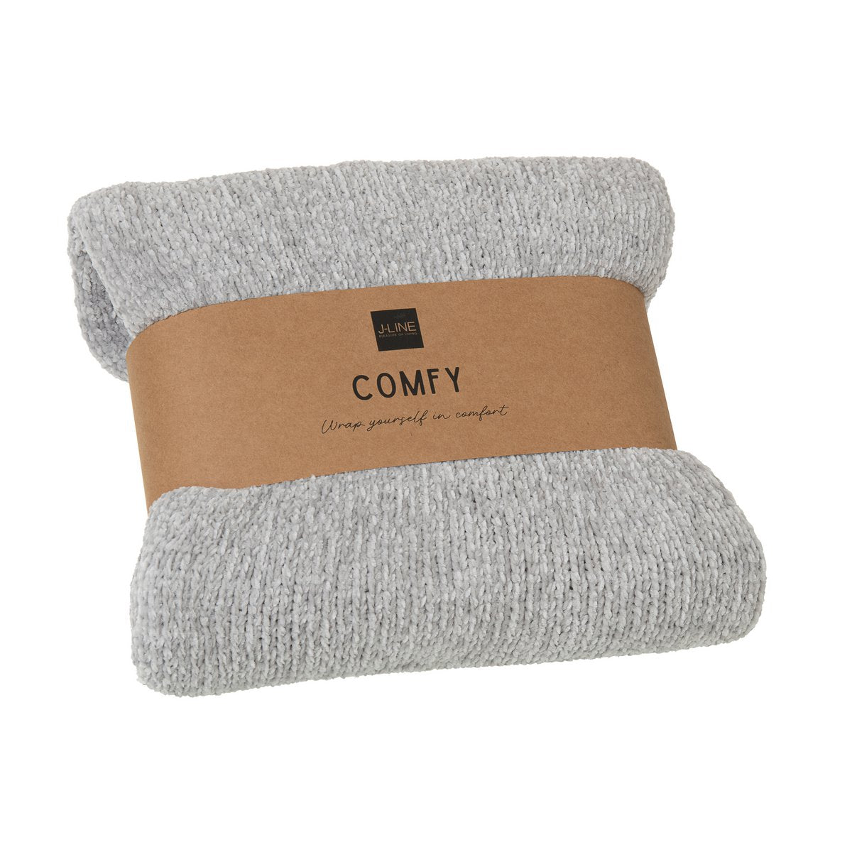 Couverture J-Line drapée sur un canapé moderne
