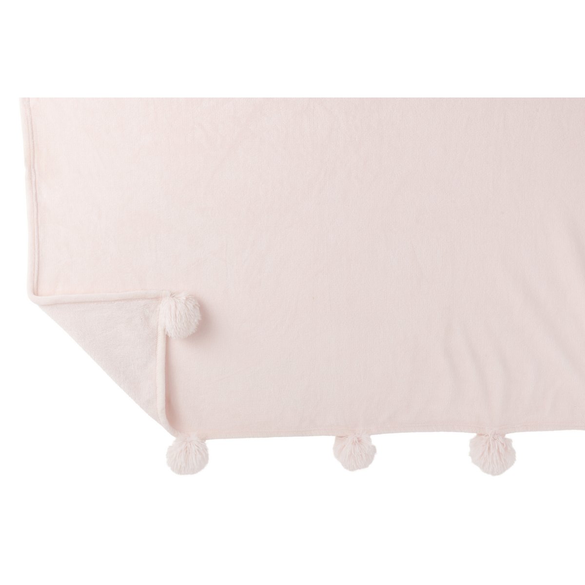 Plaid Pompon J-Line drapé sur un canapé élégant