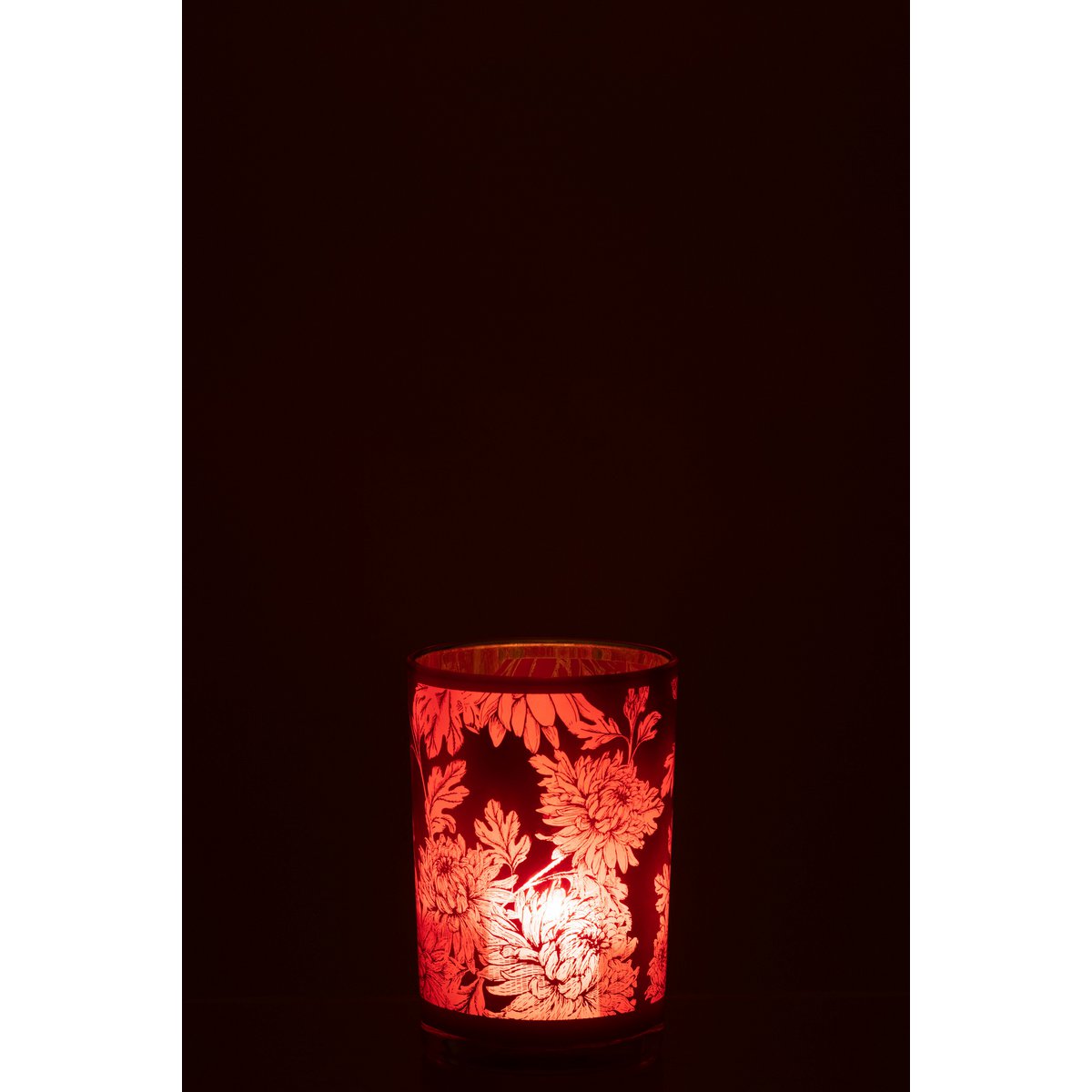 Lanterne J-Line Fleurs rouge sur une table élégante
