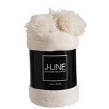 Plaid Pompon crème en situation dans un salon