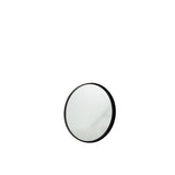 Détail du cadre en métal noir du miroir rond J-Line
