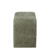 Tabouret N Shape vert menthe dans un salon moderne