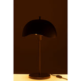 Lampe de table J-Line sur une table, ambiance intérieure