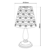 Table solaire LED 'Elsa' illuminée dans un cadre extérieur