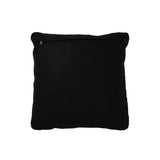 Détail du coussin J-Line en cuir noir, texture tissée