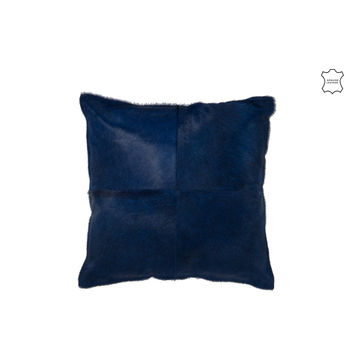 Coussin J-Line bleu électrique sur un canapé moderne, ajoutant une touche de luxe