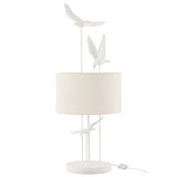 Lampe de table J-Line Birds dans un intérieur chic, ajoutant une touche de sophistication.