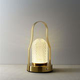 Détail de la lampe de table LED Lampuccino montrant la texture métallique