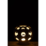 Lampe de Table Globe J-Line beige sur une table moderne