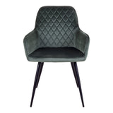 Chaise Harbo en velours vert, vue latérale montrant les pieds en métal