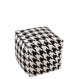 Pouf J-Line Wide sur un tapis, ajout de style à la décoration