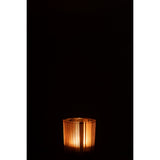 Lanterne J-Line Stripes sur une table, ambiance chaleureuse